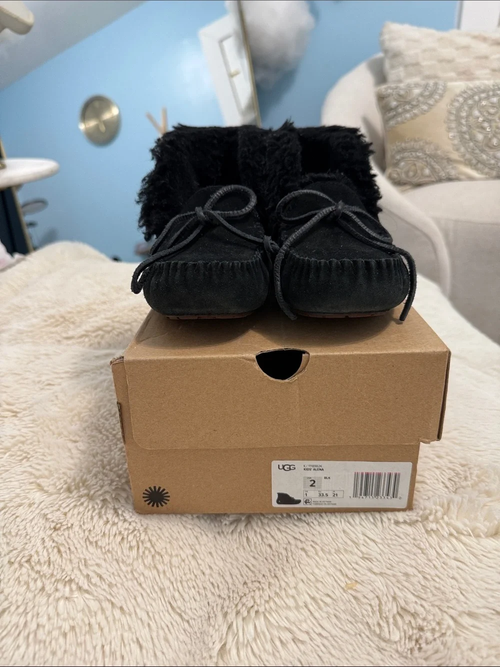 UGG Kids Black Suede Moccasin Slippers with Bow Accent